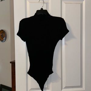 ME to WE black short sleeve body suit.